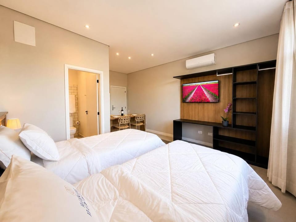 Bed, TV and multimedia, locker, air conditioner