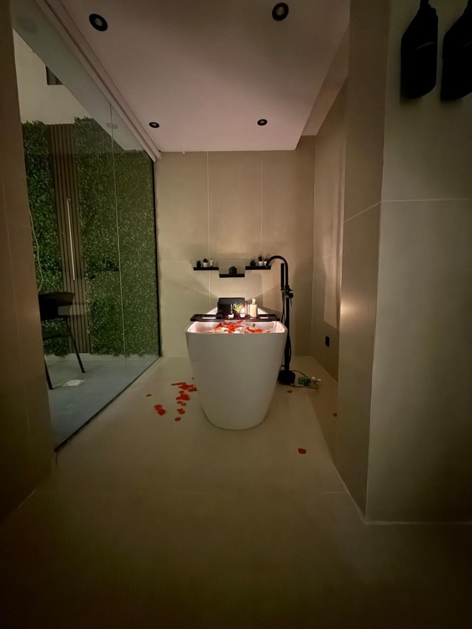 Cozy Escape Bathtub Patio Seating 65 inch TV Apartment in Riyadh