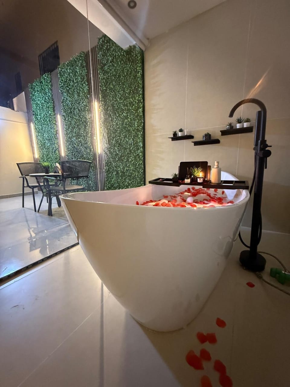 Cozy Escape Bathtub Patio Seating 65 inch TV Apartment in Riyadh