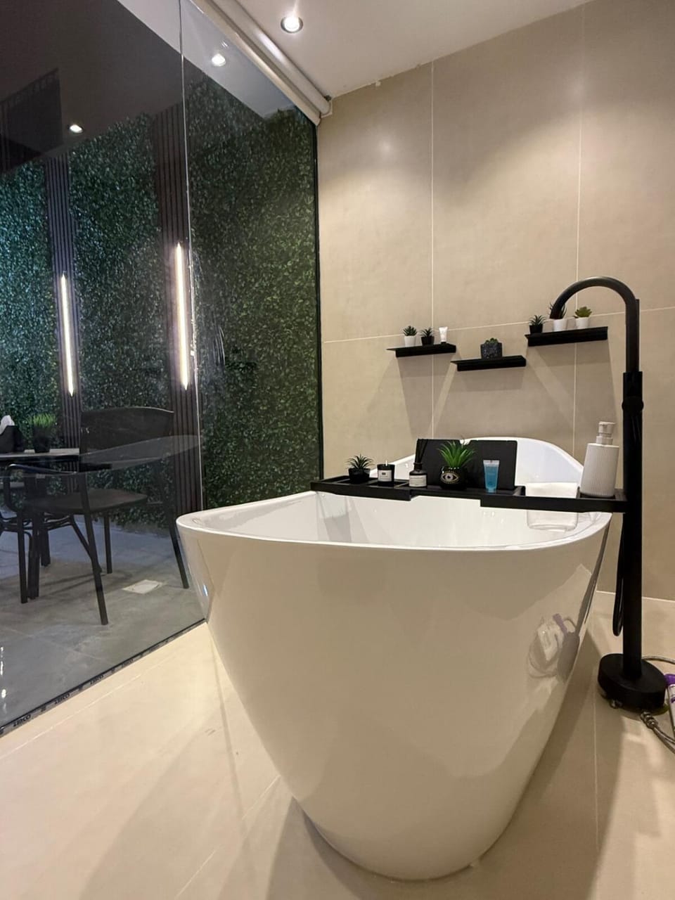 Cozy Escape Bathtub Patio Seating 65 inch TV Apartment in Riyadh