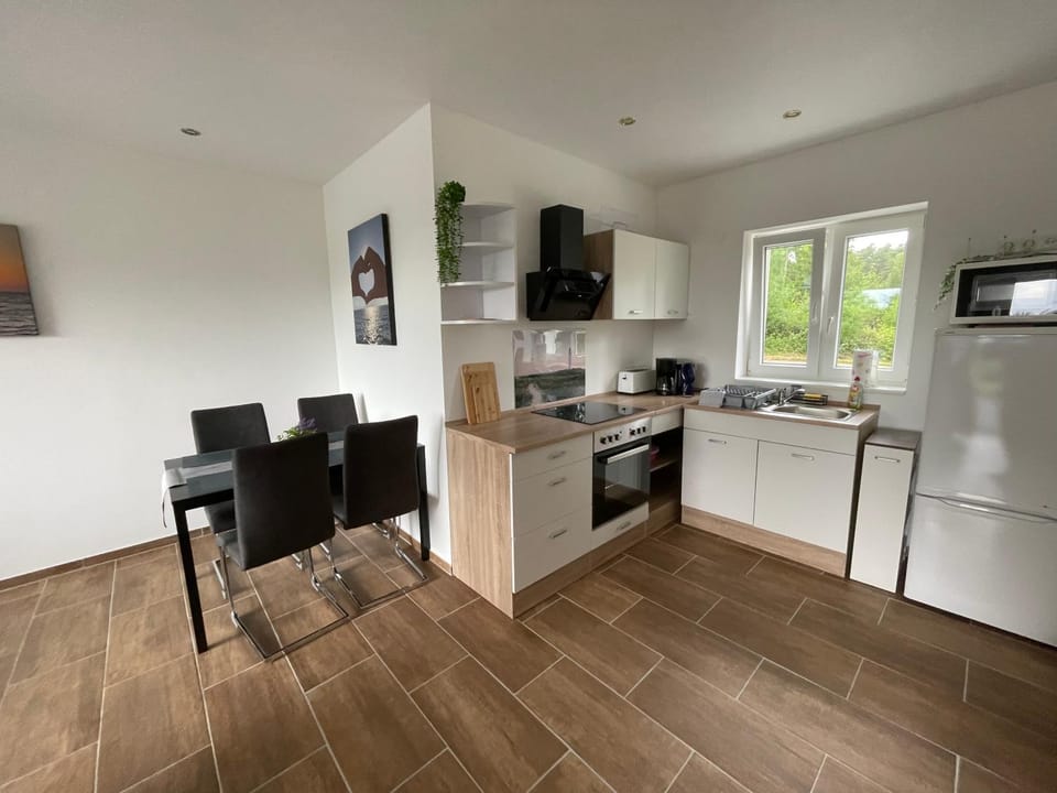 Kitchen or kitchenette, Dining area, stove, toaster