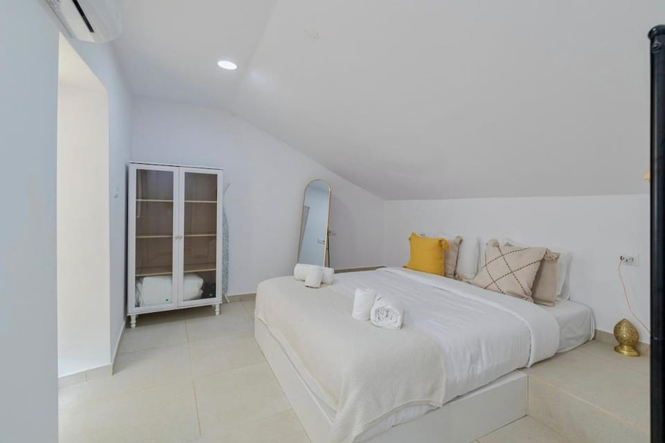 Bed, wardrobe, air conditioner