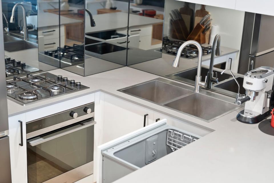 Kitchen or kitchenette, dishwasher, stove, toaster
