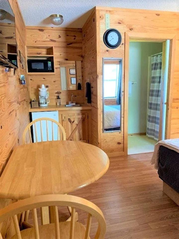 Modern Cabin with Gorgeous Wood Paneled Walls Nestled in the Scenic Beauty of the Ozarks Cabin in Mountain View