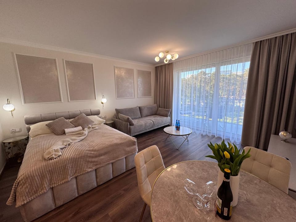 Bed, Living room, Seating area, Bedroom