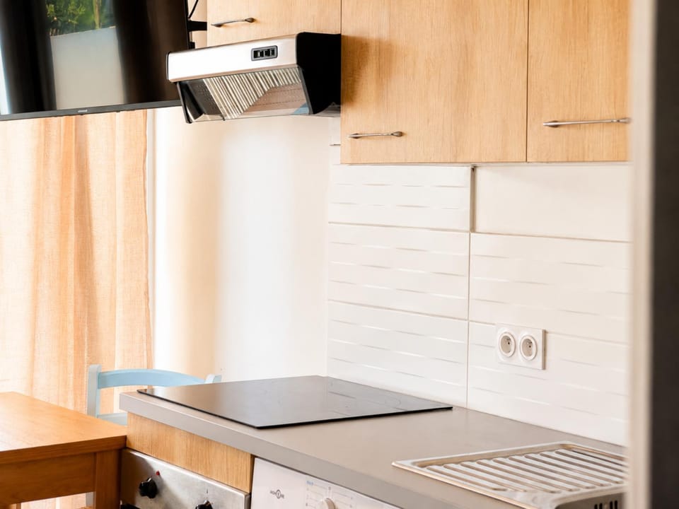 Kitchen or kitchenette, stove
