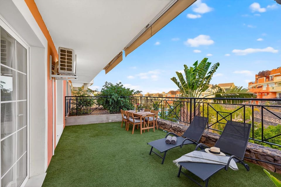 Property building, Patio, Spring, Day, View (from property/room), Balcony/Terrace, Balcony/Terrace, Seating area, Garden view, Pool view, sunbed