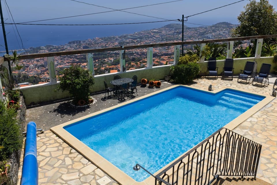 Patio, Day, Natural landscape, Mountain view, Pool view, Swimming pool, sunbed