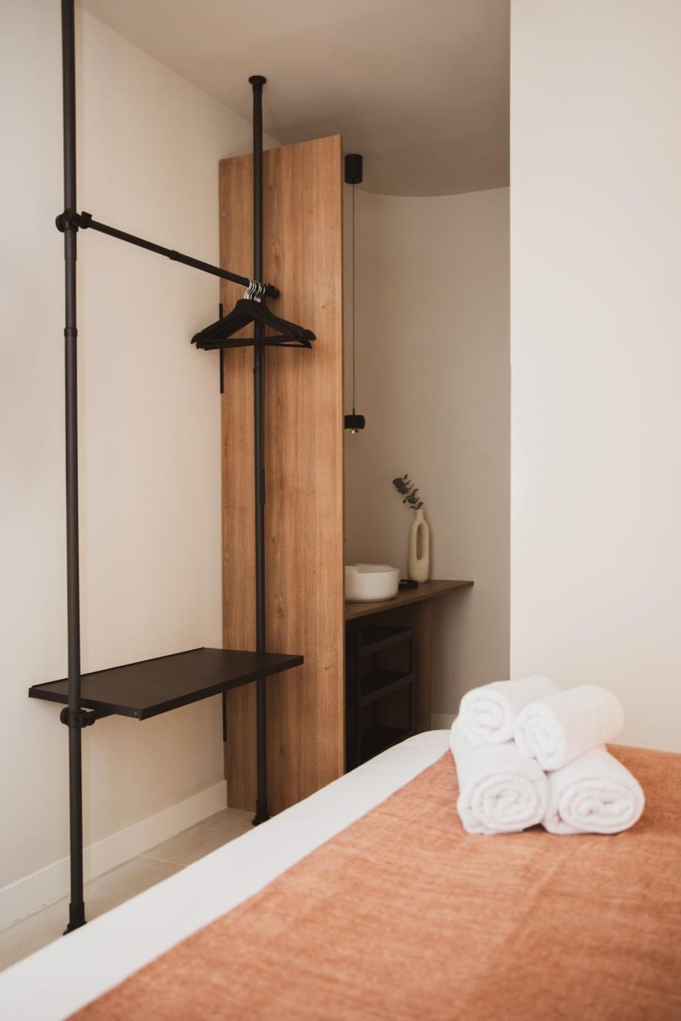 Bed, storage, towels, wardrobe