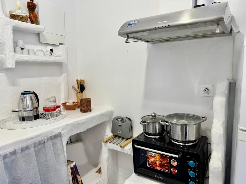 Kitchen or kitchenette, stove, toaster