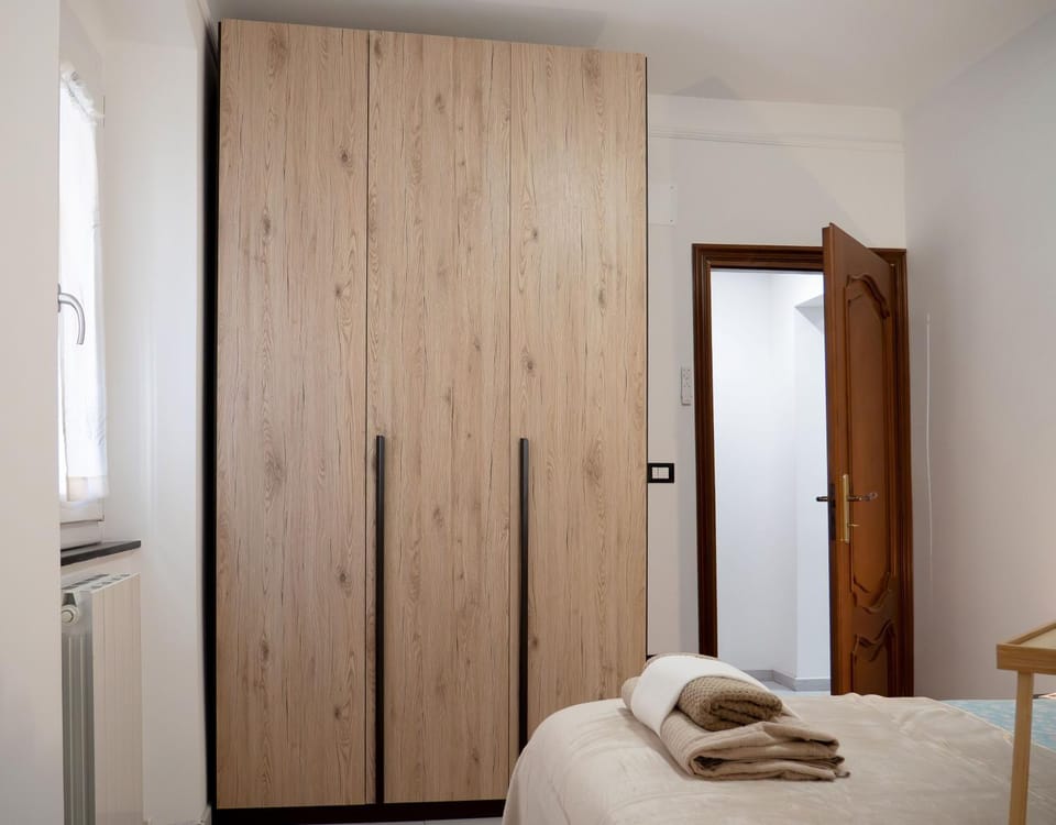 Bed, Photo of the whole room, Bedroom, towels, wardrobe