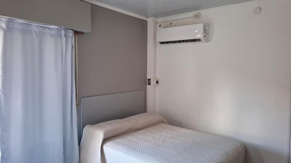 Bed, air conditioner