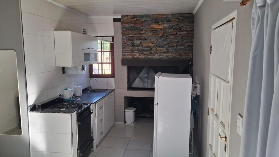 Kitchen or kitchenette, oven, stove