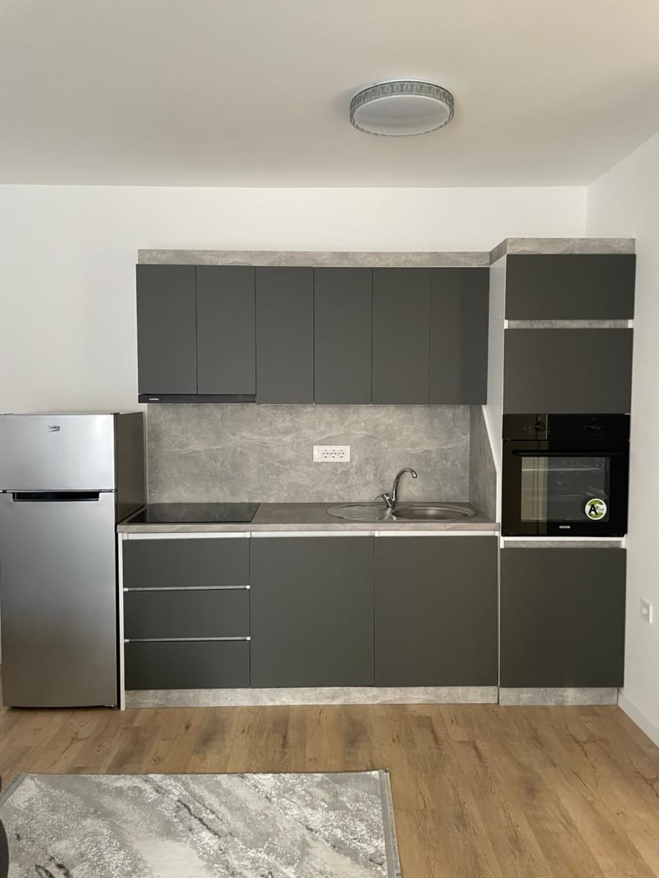 Kitchen or kitchenette, oven