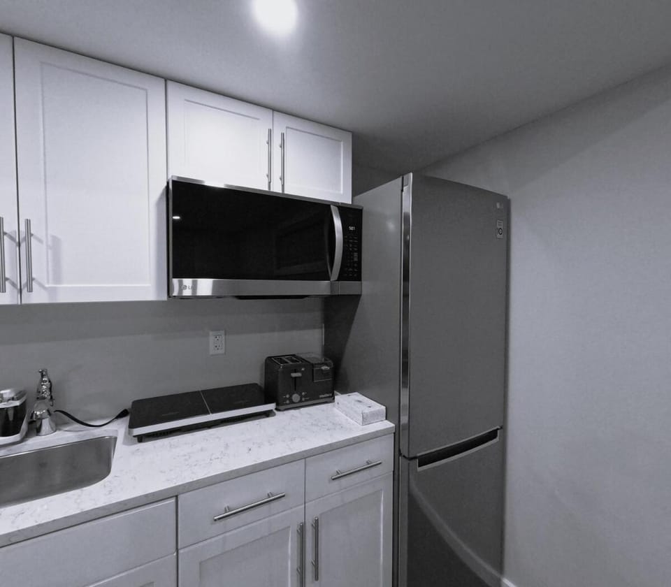 Kitchen or kitchenette, oven, stove