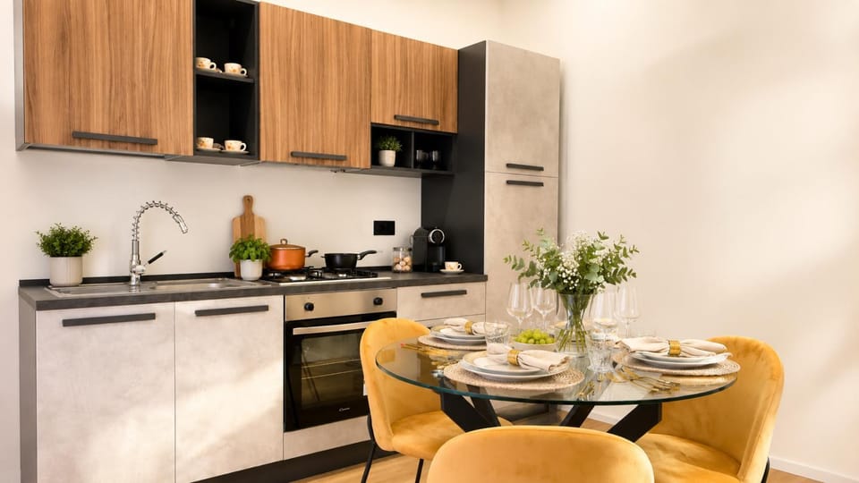 Coffee/tea facilities, Kitchen or kitchenette, Living room, Dining area, Breakfast, Breakfast, stove