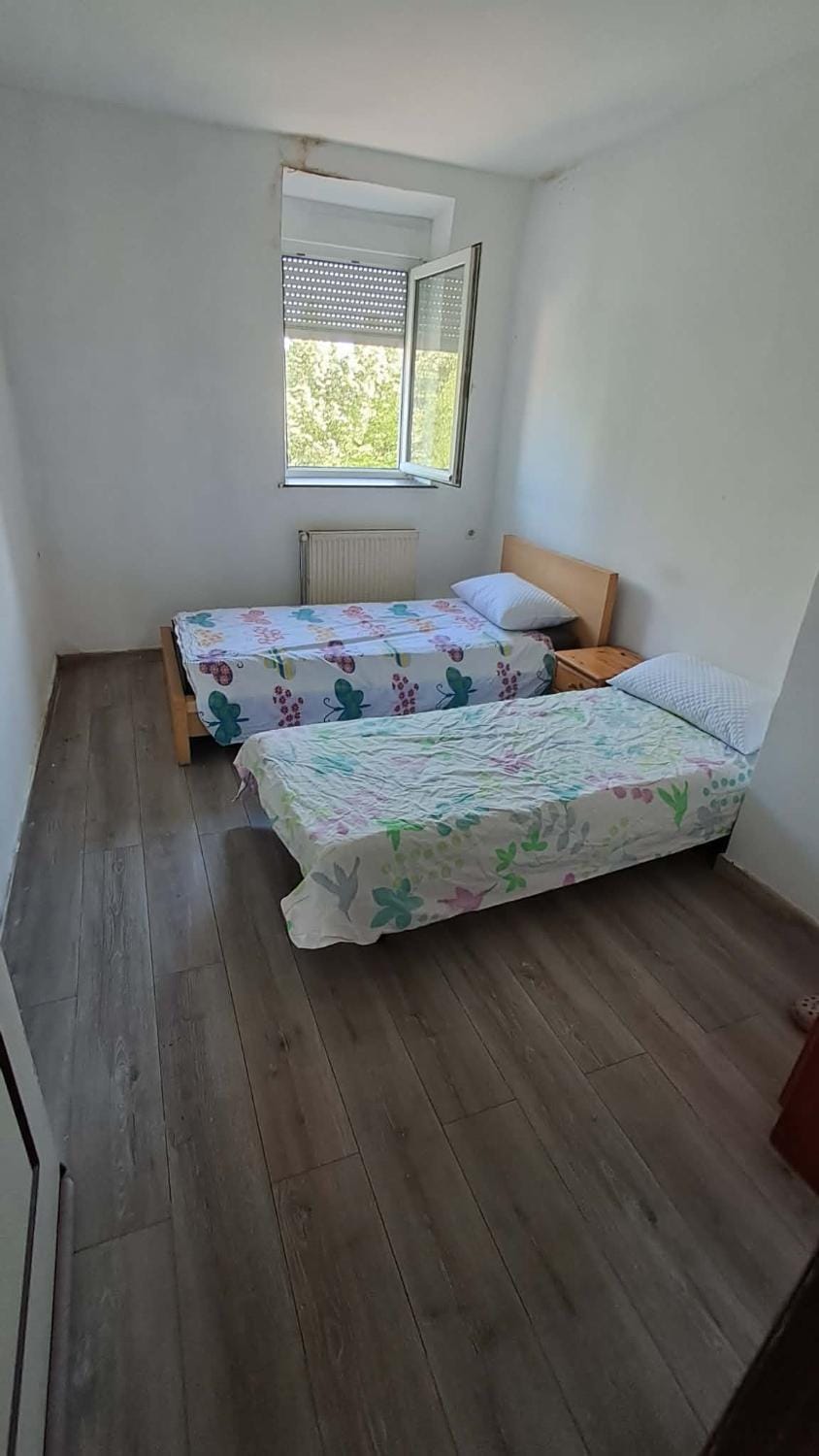 Lit dans une salle Bett im Zimmer Hostel in Mulhouse