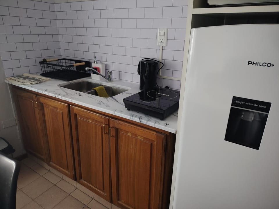 Kitchen or kitchenette, stove