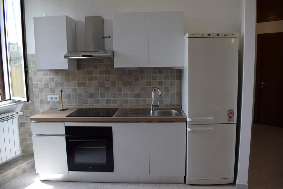 Kitchen or kitchenette, oven, stove