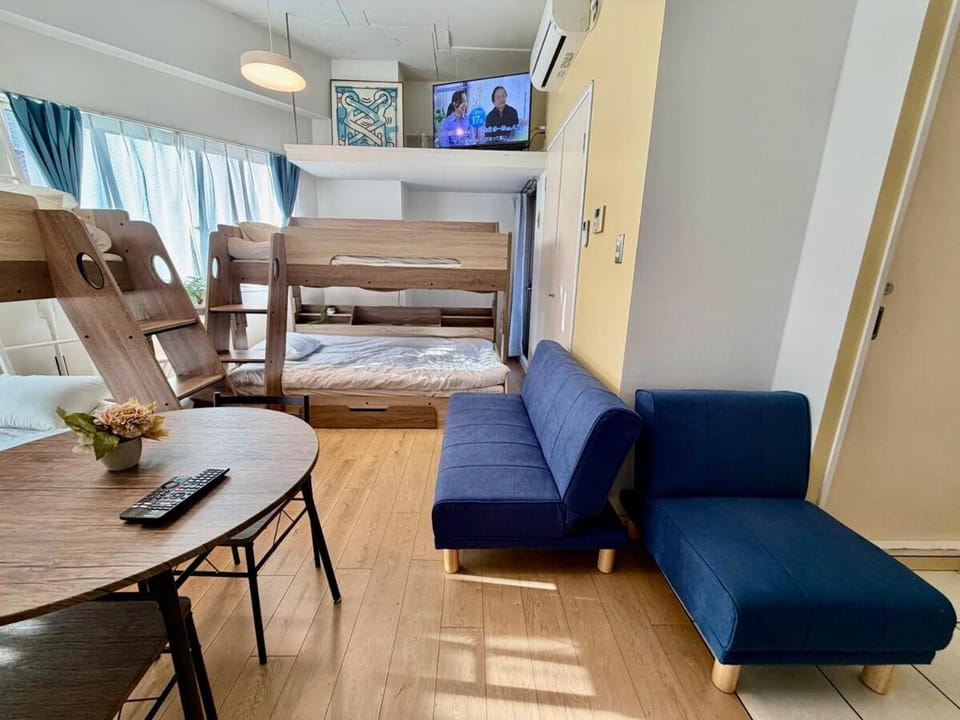 Bed, TV and multimedia, Living room, Photo of the whole room, Seating area, Bedroom