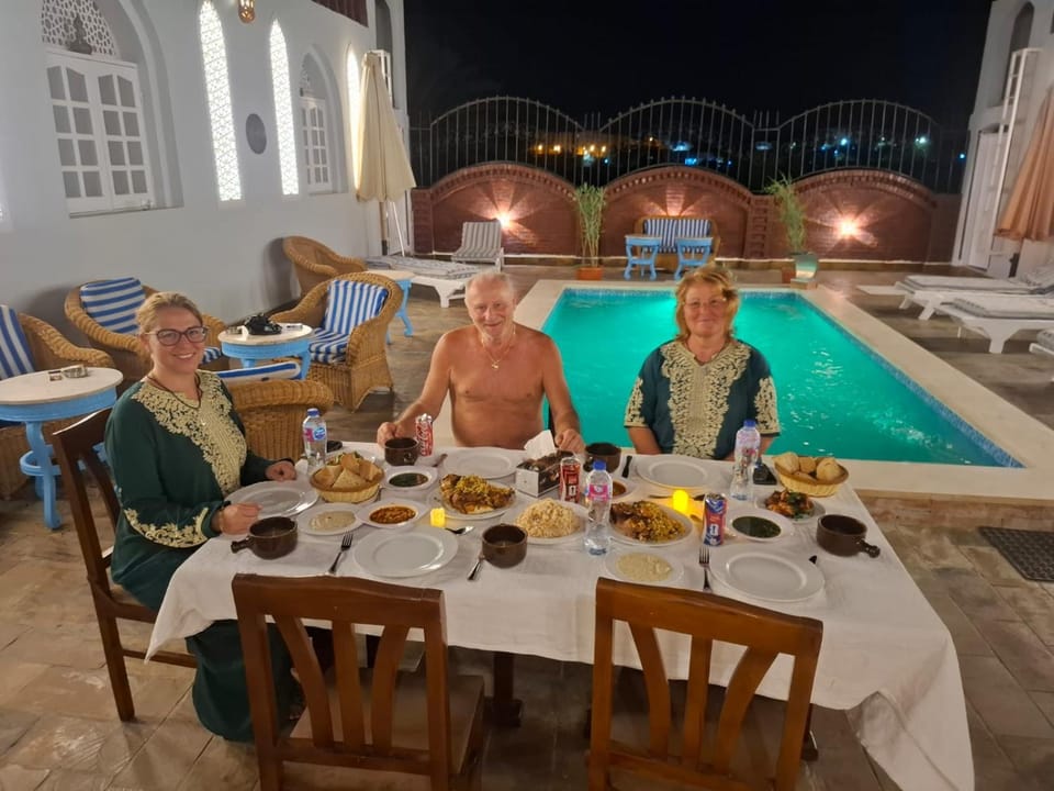 Patio, Night, People, Food and drinks, Food, Guests, Pool view, Swimming pool, Lunch, Dinner, Drinks, group of guests