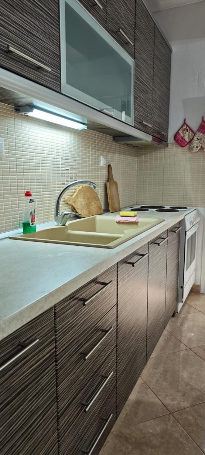 Kitchen or kitchenette, stove