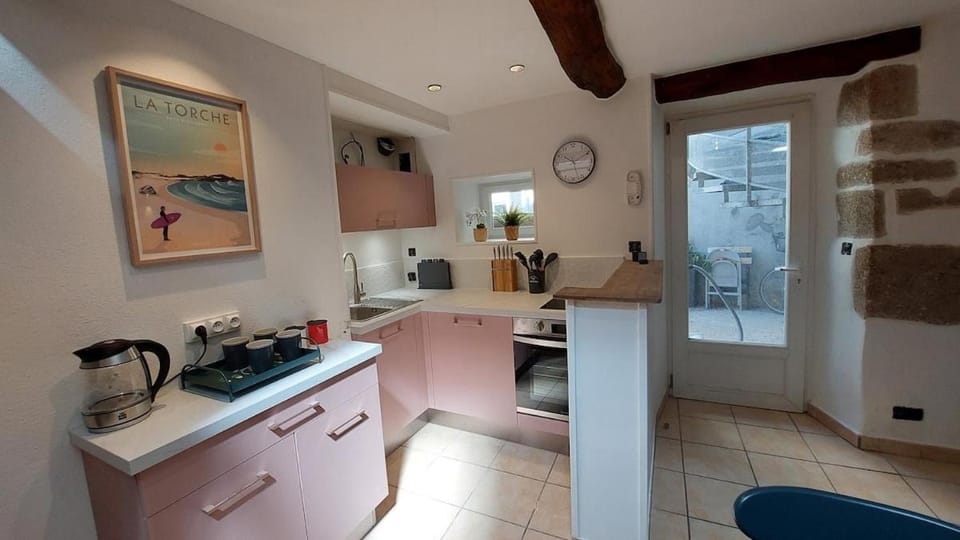 Appartement en centre-ville place du marché Apartment in Pont-l'Abbé