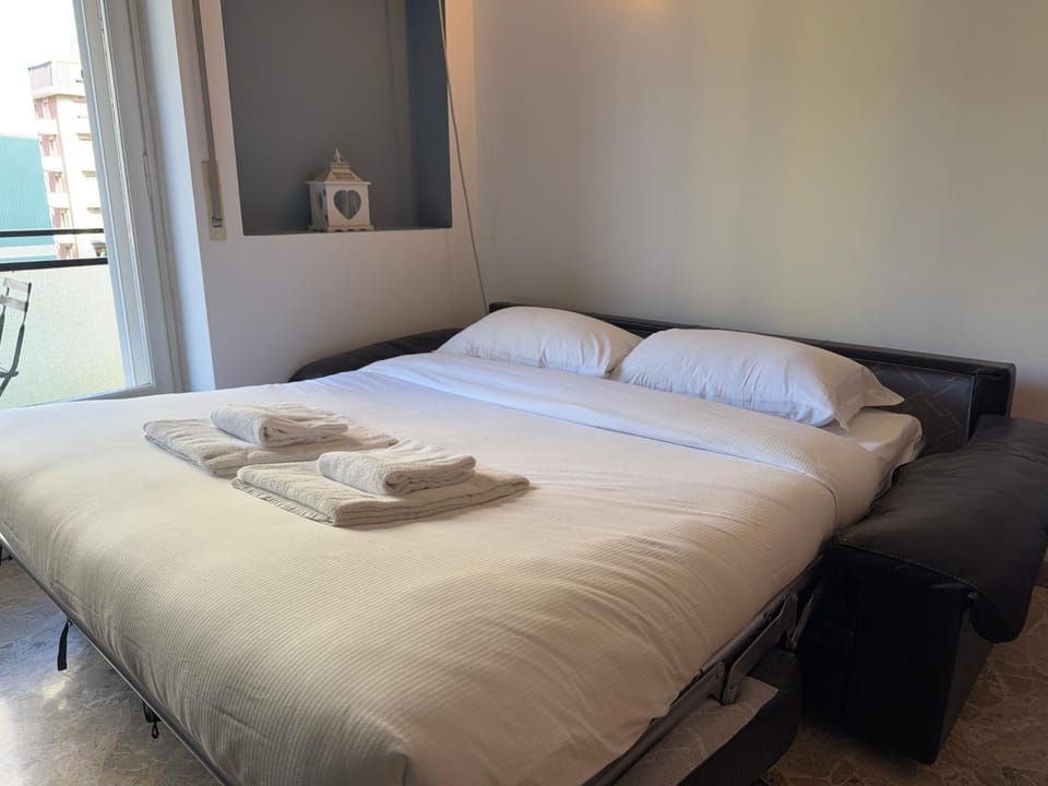 Bed, Day, Living room, Seating area, towels