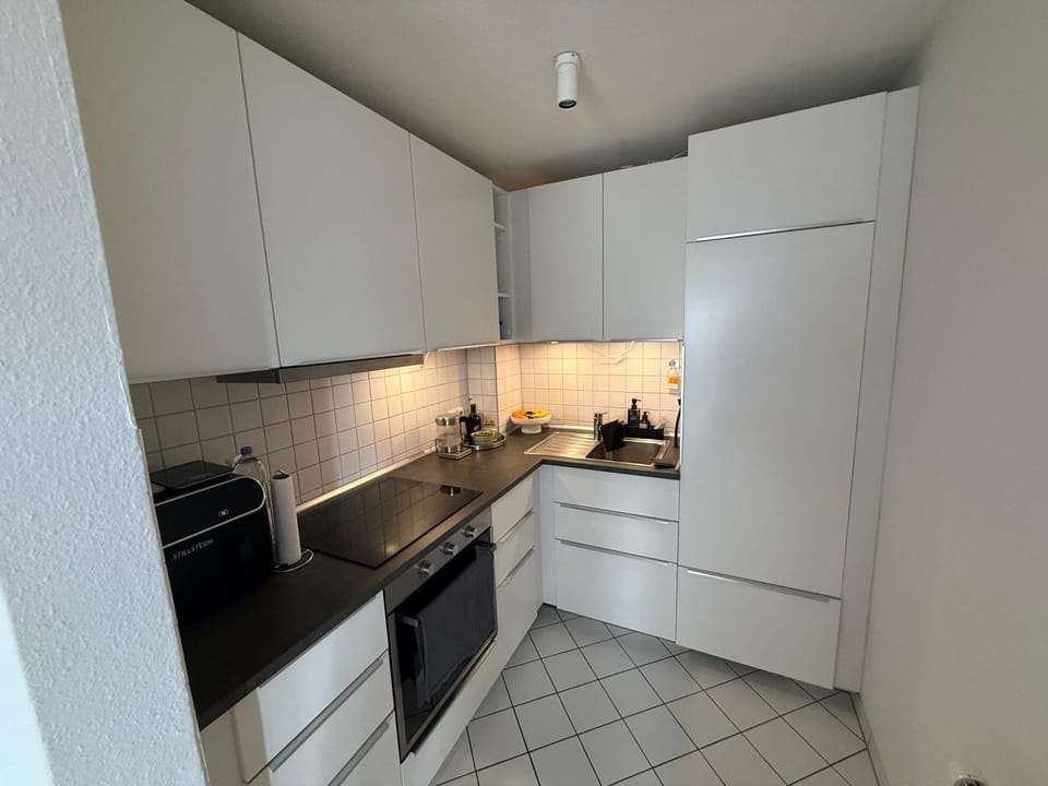 Kitchen or kitchenette, oven, stove