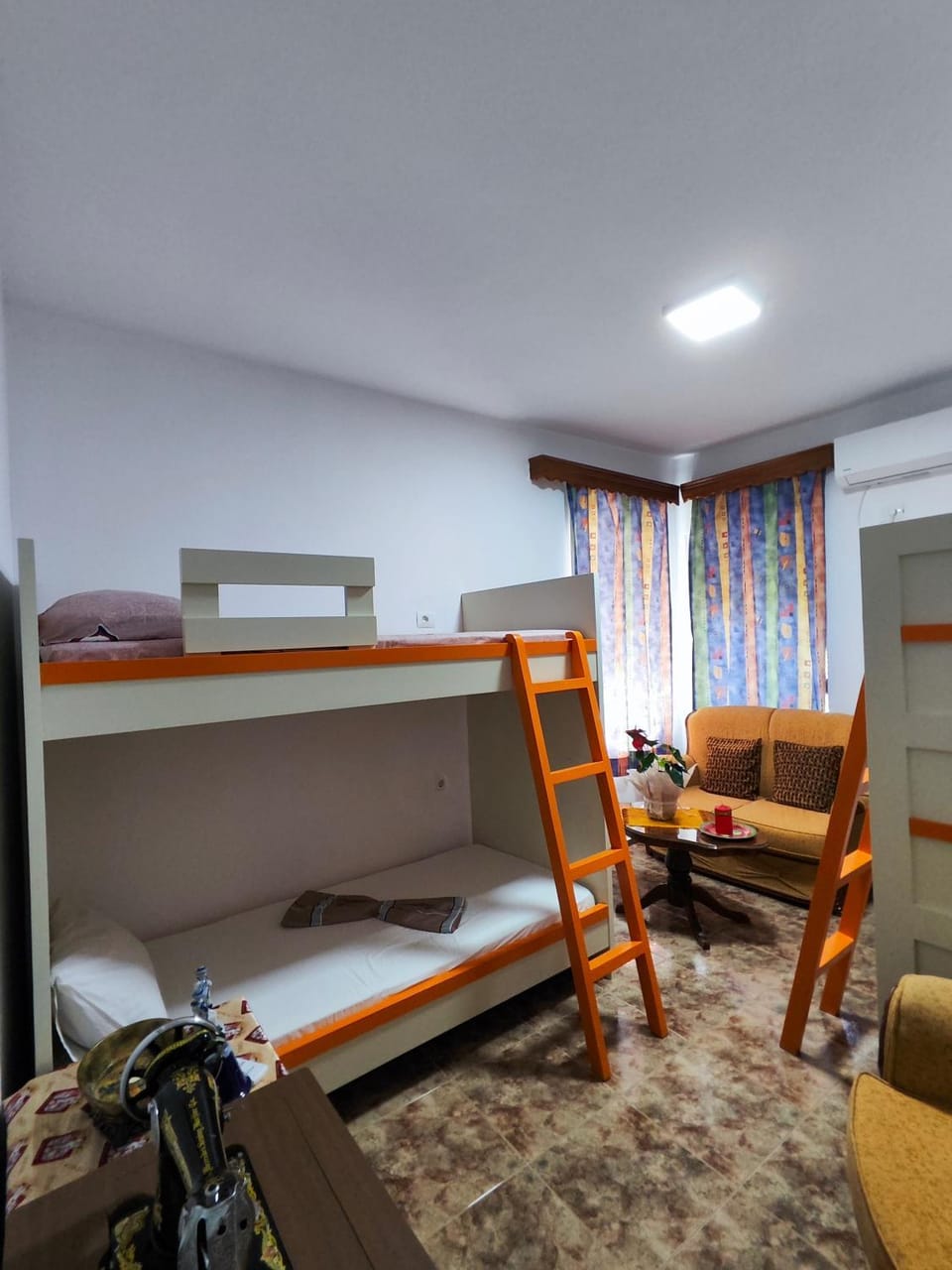 Bed, Decorative detail, Seating area, Bedroom, bunk bed, air conditioner