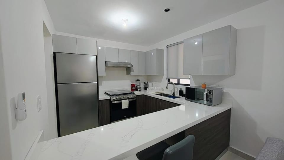 Kitchen or kitchenette, stove