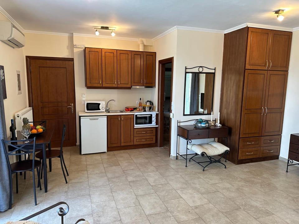 Dining area, stove, air conditioner