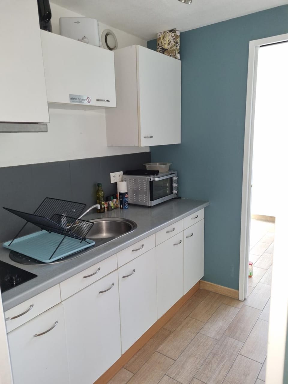Kitchen or kitchenette, stove
