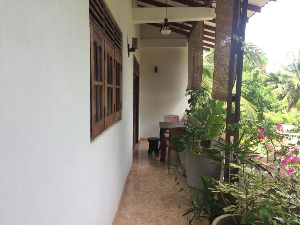 Property building, Patio, Day, Garden, Garden, View (from property/room), Balcony/Terrace, Balcony/Terrace, Garden view