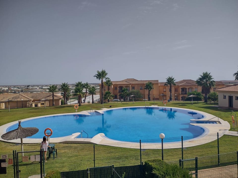 Property building, Living room, Swimming pool