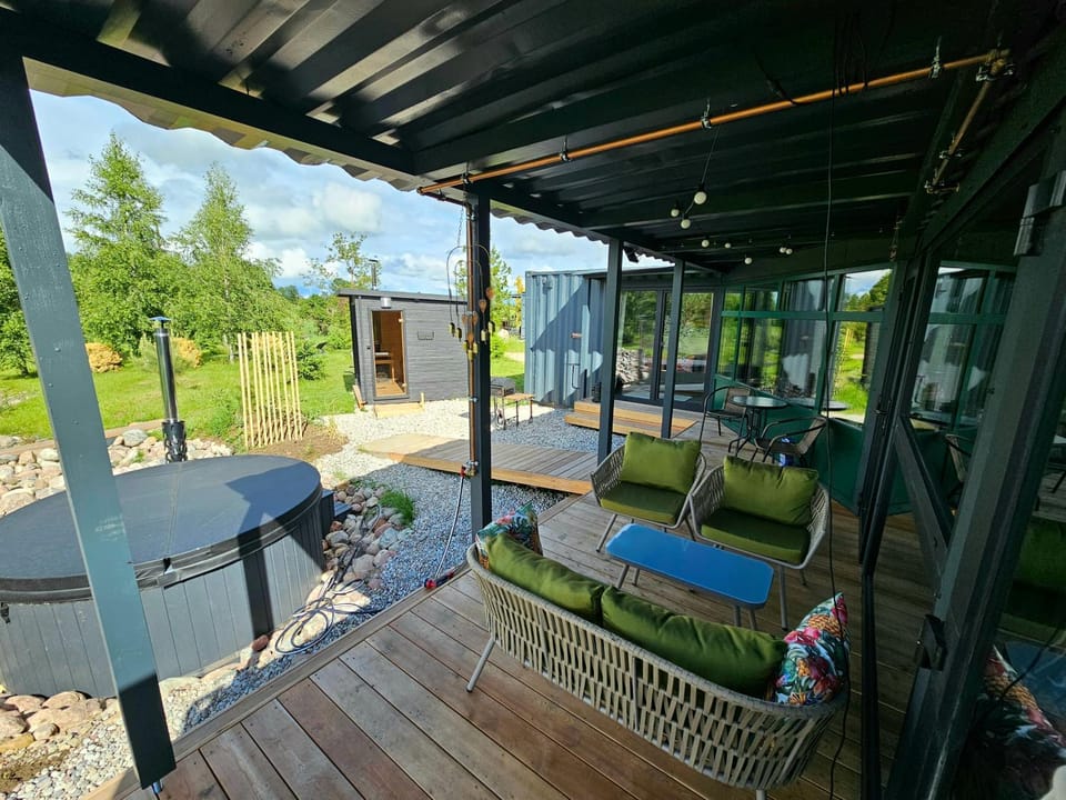 Vaitų Riešutynė - Big shipping container house House in Lithuania