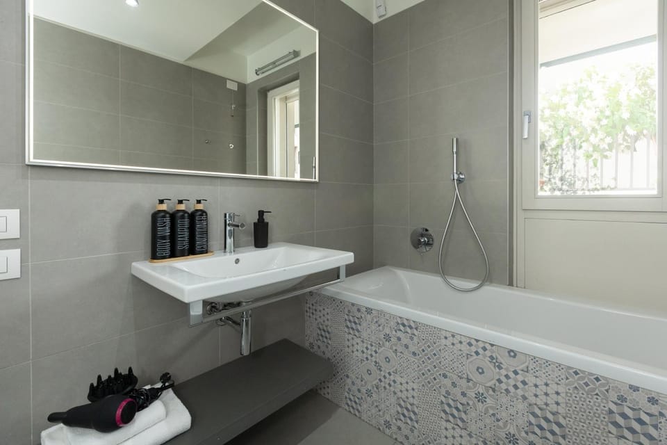 Shower, Bathroom, Decorative detail, Bath, hair dryier, towels