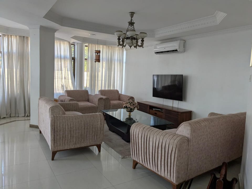 Communal lounge/ TV room, TV and multimedia, View (from property/room), Living room, Decorative detail, Seating area, Evening entertainment, Landmark view, Pool view, Sea view, internet, air conditioner