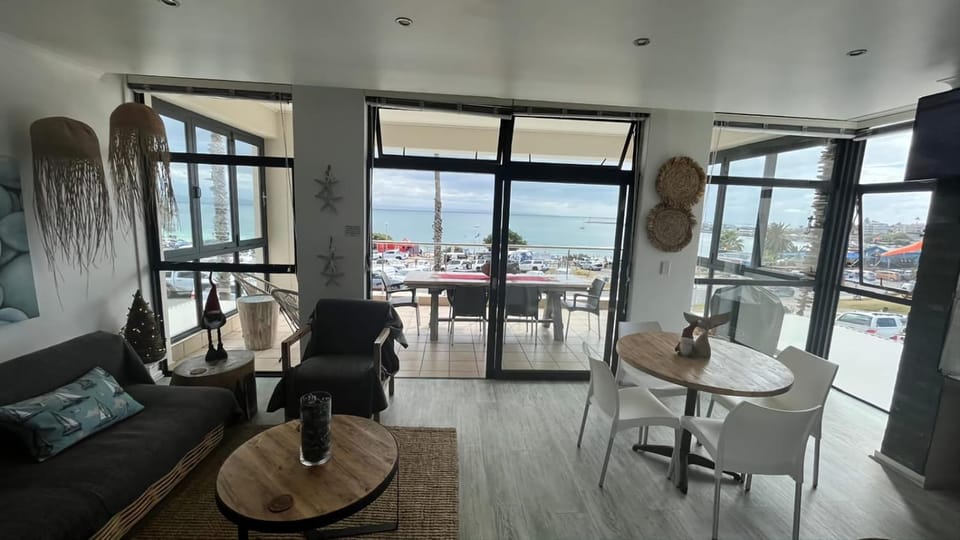 View (from property/room), Balcony/Terrace, Living room, Seating area, Dining area, Sea view