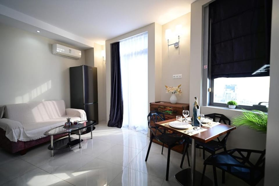 Вид из спальни на закат и море с отдельной спальней Premium Apartment in Batumi