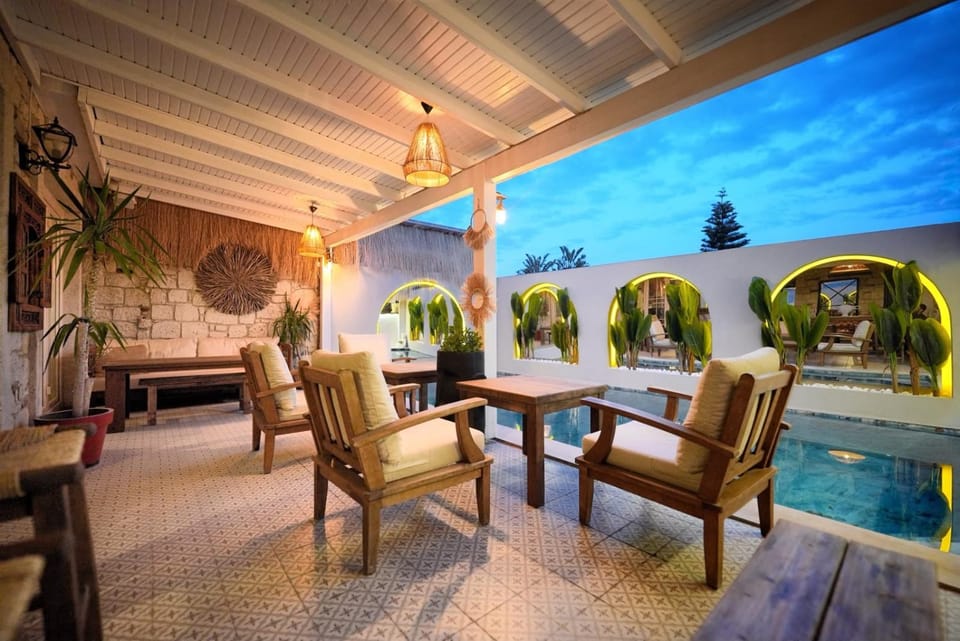 Patio, Natural landscape, Living room, Seating area, Pool view, Swimming pool