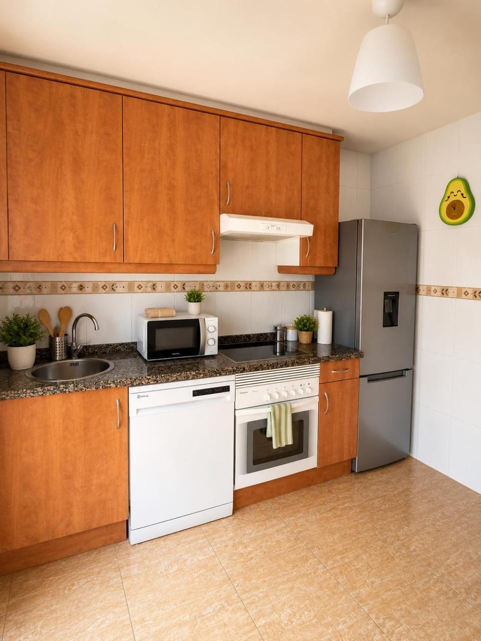 Kitchen or kitchenette, dishwasher, oven, toaster