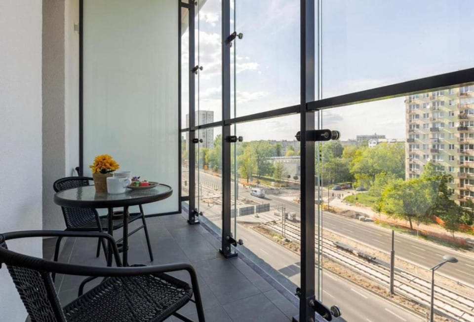 View (from property/room), Balcony/Terrace, Seating area, City view