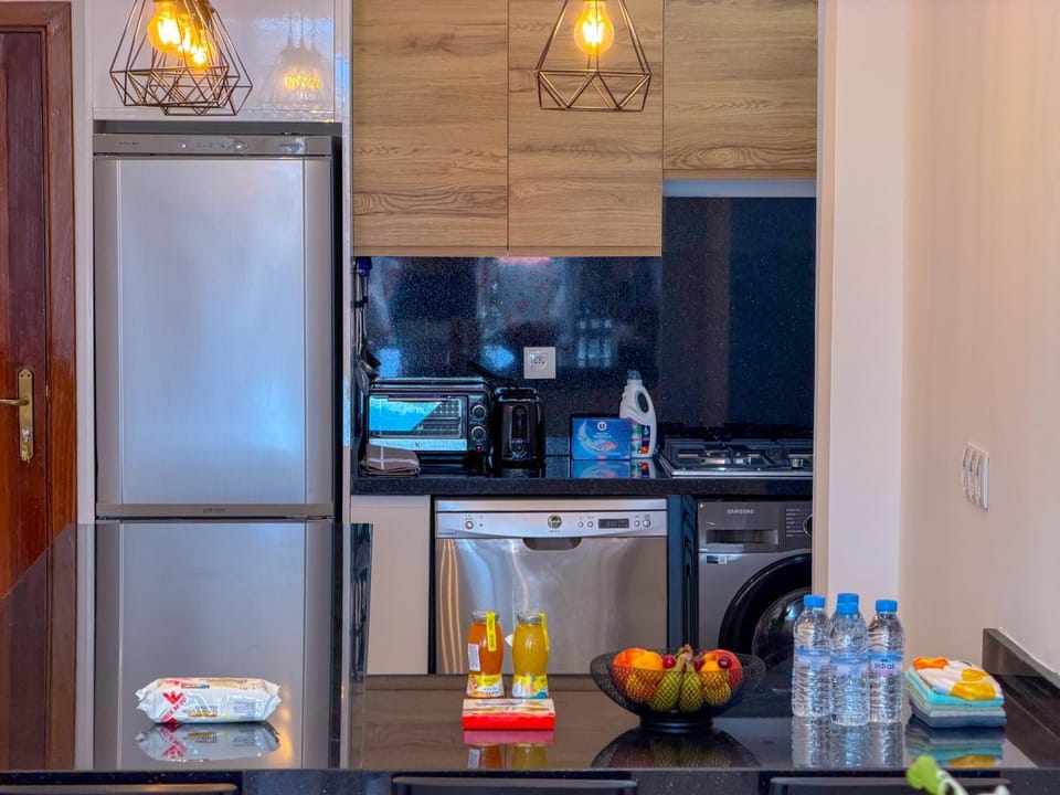 Kitchen or kitchenette, stove, toaster