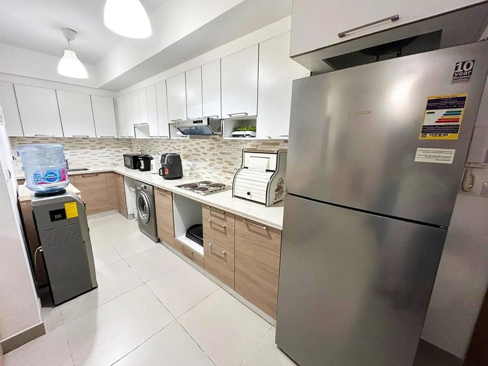 Kitchen or kitchenette, washing machine