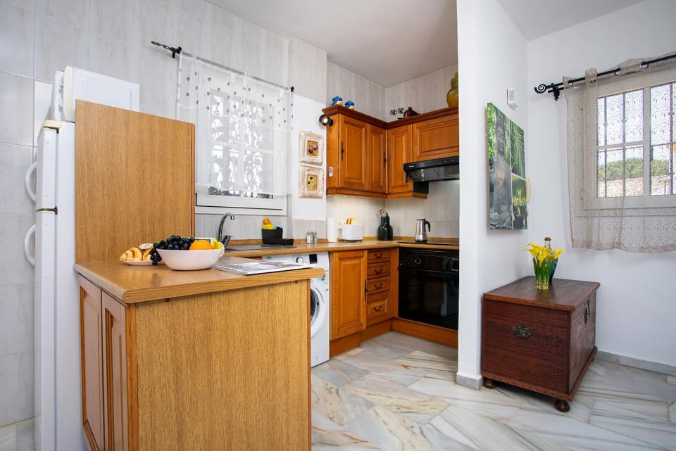 Kitchen or kitchenette, oven, stove, toaster