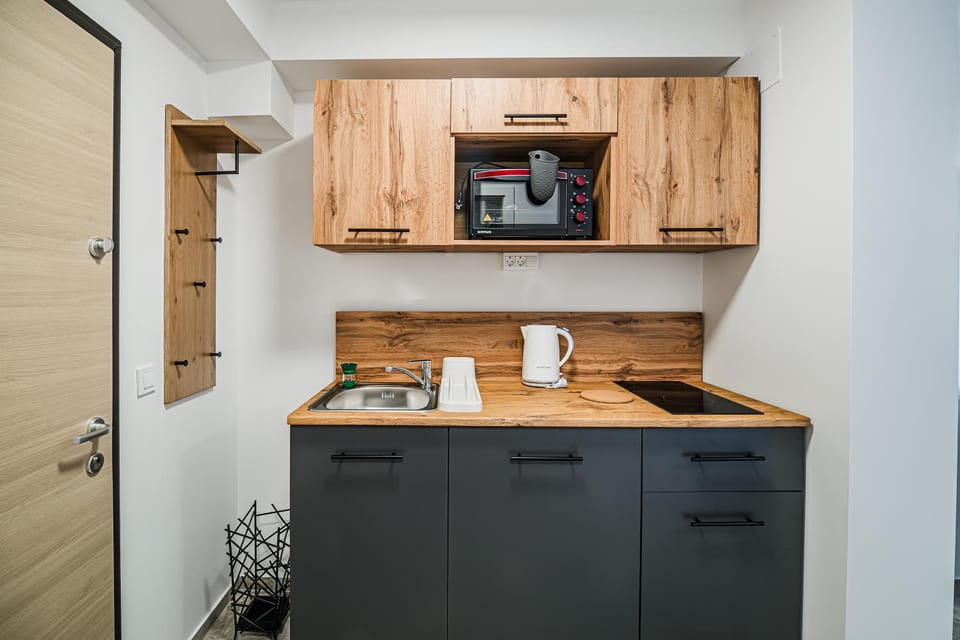 Kitchen or kitchenette, oven, stove