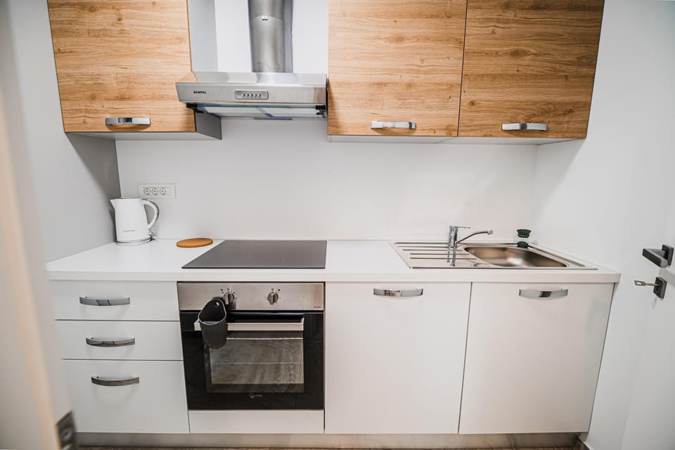 Kitchen or kitchenette, oven, stove