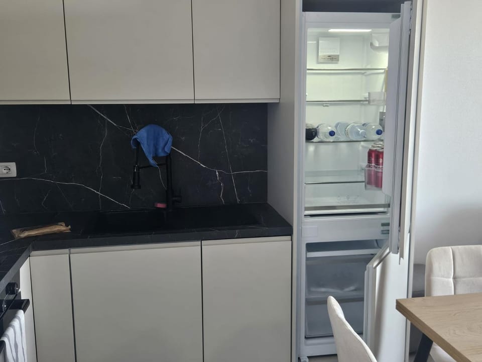 Kitchen or kitchenette, oven, stove