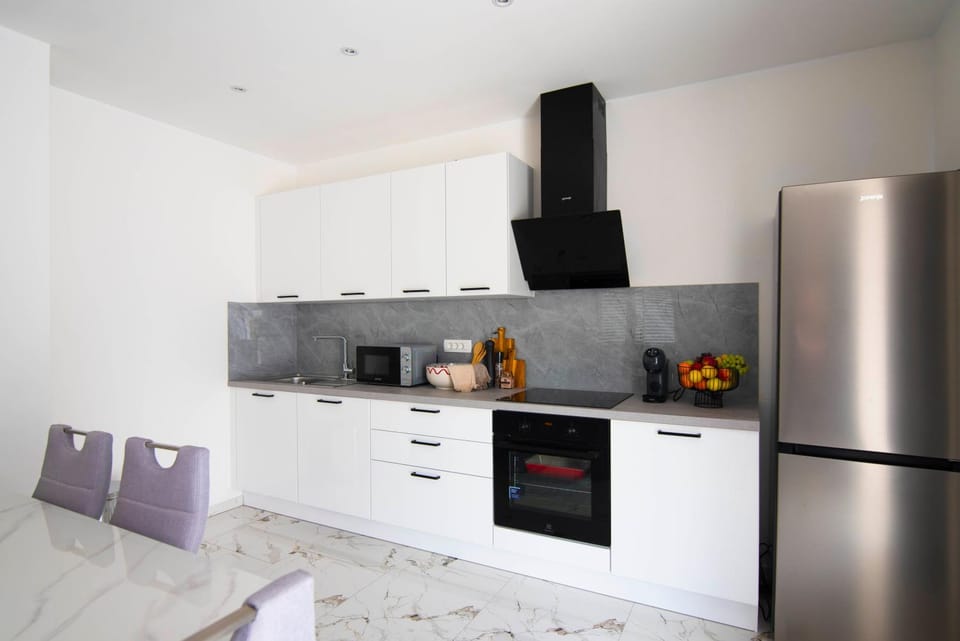 Vacation apartments Mario with salt water pool Apartment in Split-Dalmatia County